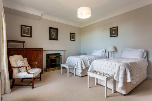 Ένα ή περισσότερα κρεβάτια σε δωμάτιο στο Tarbert Country Manor