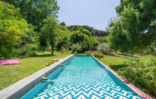 a swimming pool in a yard with trees at Nocellara in Alia