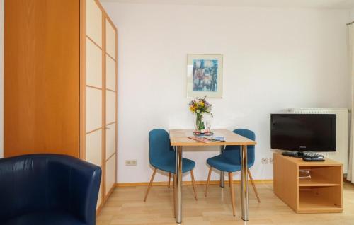 Televisyen dan/atau pusat hiburan di Ferienwohnung 48M² Tannheim