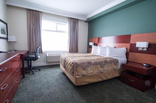 Katil atau katil-katil dalam bilik di Nova Inn Manning