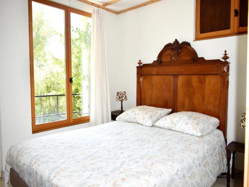 Ένα ή περισσότερα κρεβάτια σε δωμάτιο στο Holiday Home in Saint-Honore - Les Bains