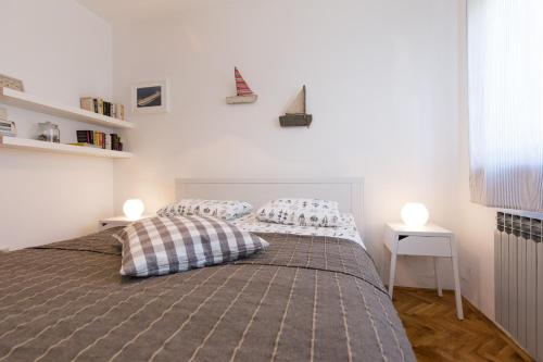 Katil atau katil-katil dalam bilik di Captain's Apartment with Sea View