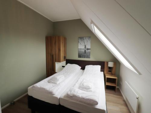 Katil atau katil-katil dalam bilik di Spacious holiday home in Leons with garden