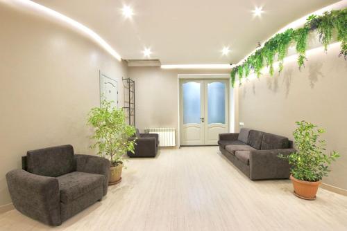 Χώρος καθιστικού στο Altamira Hotel