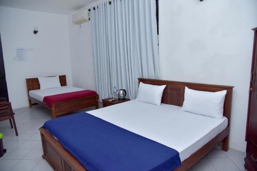 Ein Bett oder Betten in einem Zimmer der Unterkunft Absolute Breeze by cherins