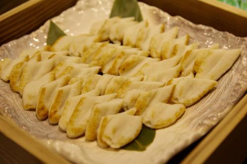 a plate of food with banana slices on it at Almont Hotel Sendai in Sendai