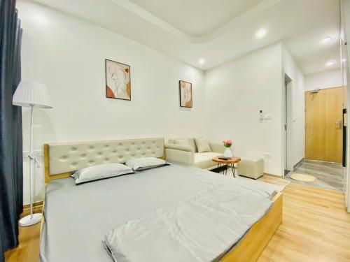 Postel nebo postele na pokoji v ubytování Happy Nest Home - Long Bien