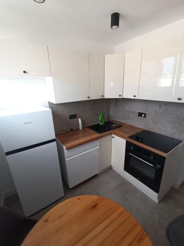 Kuchyň nebo kuchyňský kout v ubytování Apartament Jasne