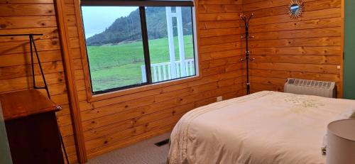 Ένα ή περισσότερα κρεβάτια σε δωμάτιο στο Pleasant View Lodge