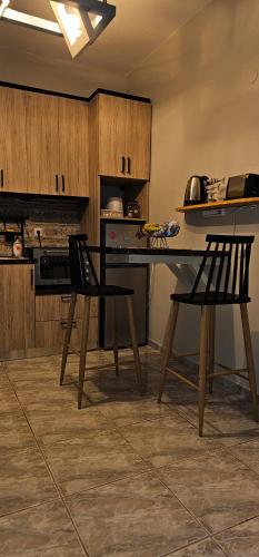 Kuchyň nebo kuchyňský kout v ubytování Alora House