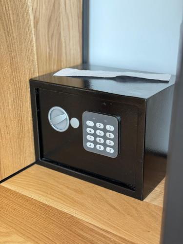 a microwave oven sitting on top of a table at Шишка in Bukovel