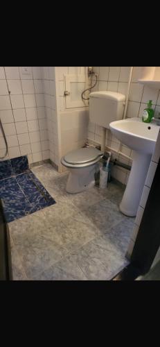 Koupelna v ubytování Apartament Neptun