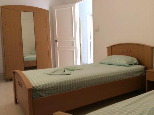 Postel nebo postele na pokoji v ubytování Maison Karim