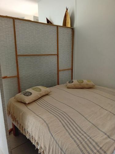 Postel nebo postele na pokoji v ubytování T kai