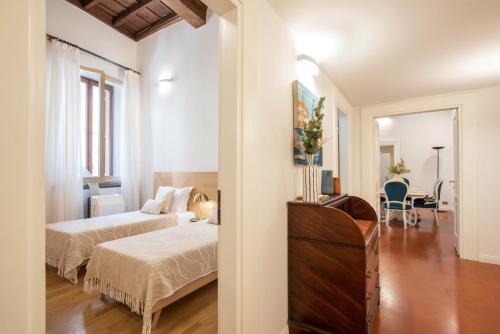 Posteľ alebo postele v izbe v ubytovaní Avila Palace Piazza Navona