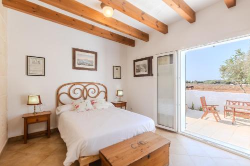 Posteľ alebo postele v izbe v ubytovaní Agroturismo Son Rosas