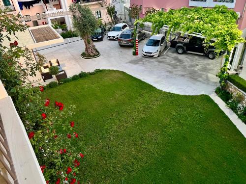 an aerial view of a parking lot with cars parked at Valentinos House in Parga