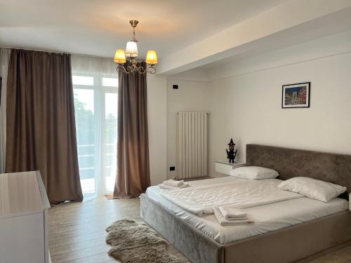 Llit o llits en una habitació de EFORIE STUDIOS