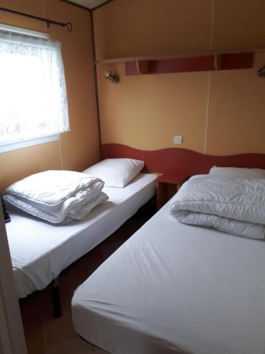 Postel nebo postele na pokoji v ubytování Mobil Home