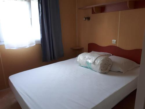 Postel nebo postele na pokoji v ubytování Mobil Home
