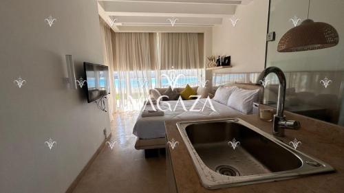 Μια τηλεόραση ή/και κέντρο ψυχαγωγίας στο For Rent Costal Style Cabana at Seashell, North Coast, Egypt