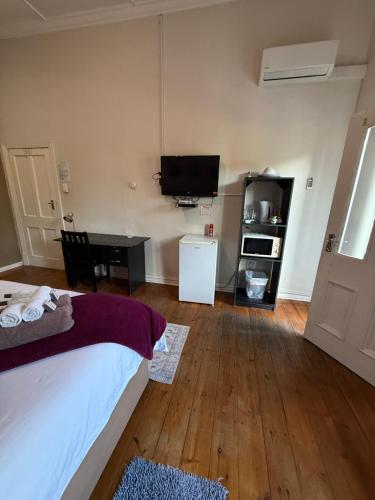 Postel nebo postele na pokoji v ubytování Tranquil Guest House