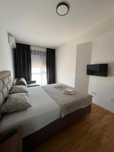 Postel nebo postele na pokoji v ubytování Leo Lux 2
