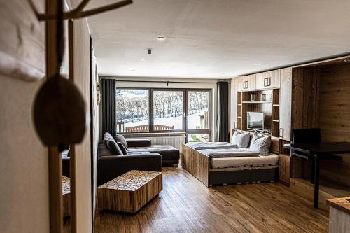 Postel nebo postele na pokoji v ubytování Steibis Nest für Paare