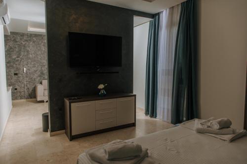 Postel nebo postele na pokoji v ubytování Hermosa Hotel