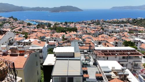 a view of a city with buildings and the ocean at Brow City Kaş in Kas