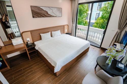Ένα ή περισσότερα κρεβάτια σε δωμάτιο στο Sunshine Hotel