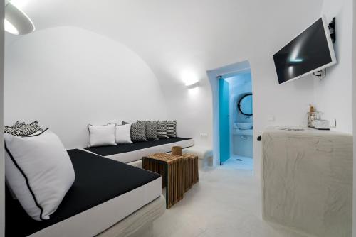 TV a/nebo společenská místnost v ubytování Modernity Suites