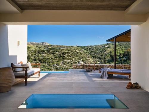 a view from the living room of a house at Pezoules House II in Lefkes