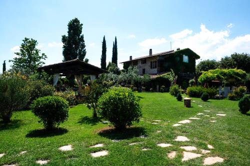 A garden outside Tenuta San Masseo - boutique farm resort & SPA