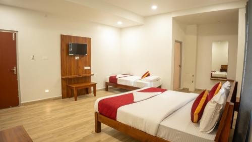 Postel nebo postele na pokoji v ubytování Hotel Sun Suites - A unit of SUN Group - Spacious Rooms - Brand New Building