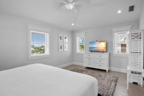 En eller flere senge i et værelse på Day Break Bungalow