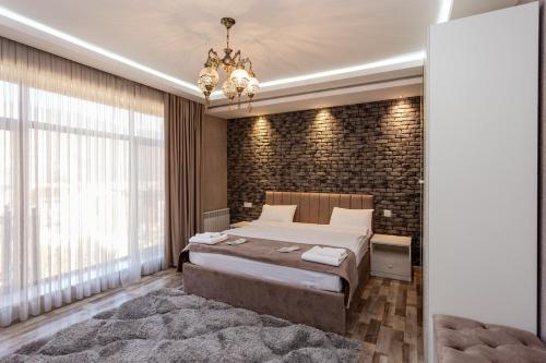 Katil atau katil-katil dalam bilik di GoodMood Hotel&Restoran