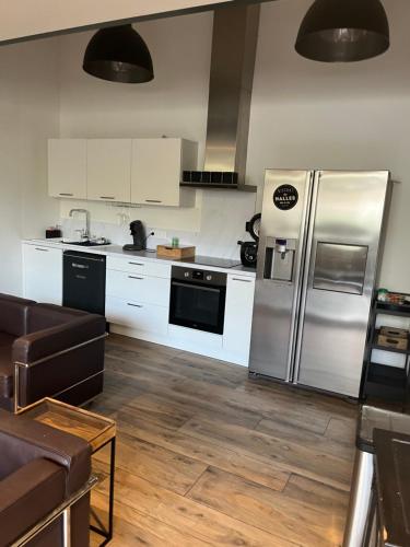Kuchyň nebo kuchyňský kout v ubytování Loft centre ville à saintes
