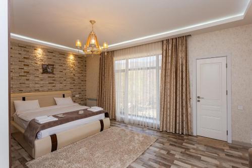 Katil atau katil-katil dalam bilik di GoodMood Hotel&Restoran
