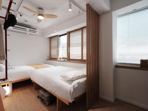 Katil atau katil-katil dalam bilik di The Road Mini Hotel