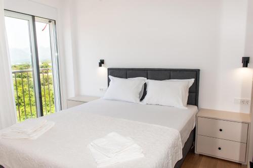 Postel nebo postele na pokoji v ubytování Konzul apartment