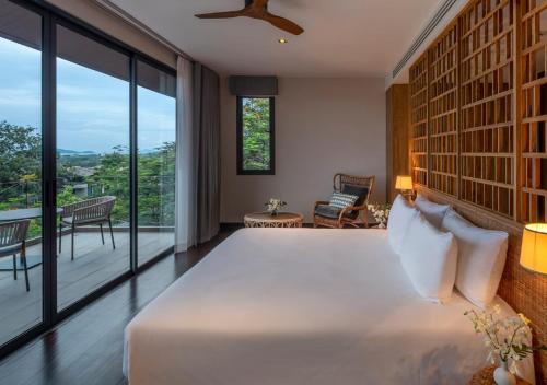 Katil atau katil-katil dalam bilik di Noku Phuket