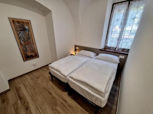 Letto o letti in una camera di Il Nido dell'Adriana Apartment