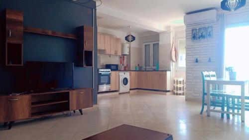 Una cocina o zona de cocina en Résidence brahmi