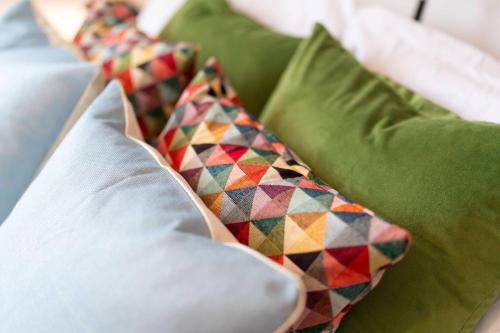 two pillows sitting on top of a couch at Westland Shores in Crail