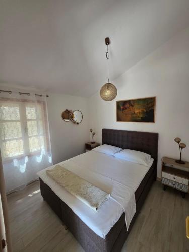 Llit o llits en una habitació de Winery Bačić