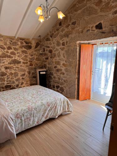 Postel nebo postele na pokoji v ubytování Casa A Barcia