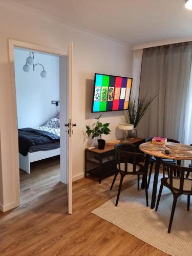 Ένα ή περισσότερα κρεβάτια σε δωμάτιο στο Apartament dla 2 osób nad rzeką