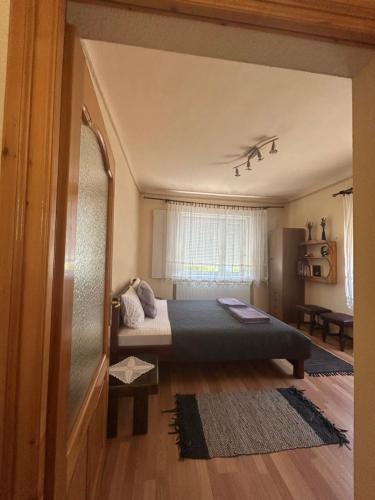 Postel nebo postele na pokoji v ubytování Kuća na selu “ANNA”