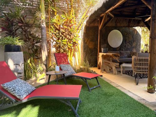 Posezení v ubytování ORCHID Villa luxueuse avec piscine privée- A 600m de la plage